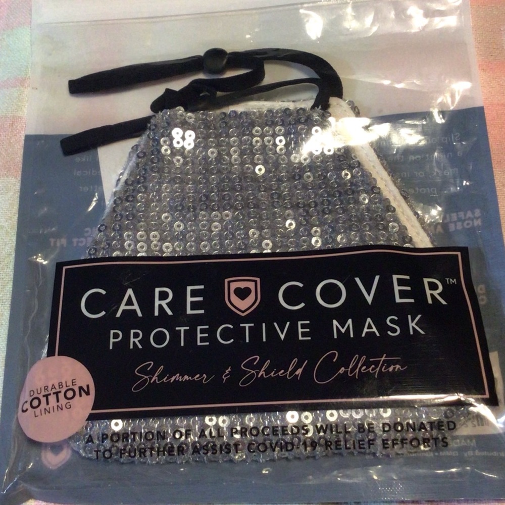 Care Cover mask. Silver sequins. New in bag. Opened for photos only.